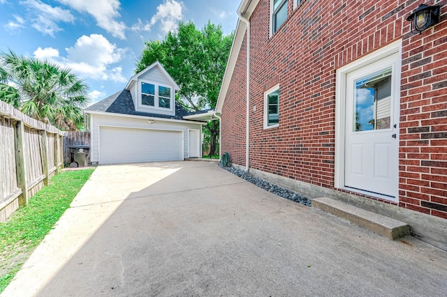 8903 Loch Lomond Ct, Houston, TX 77096 - view of side of home with brick siding and an outbuilding
