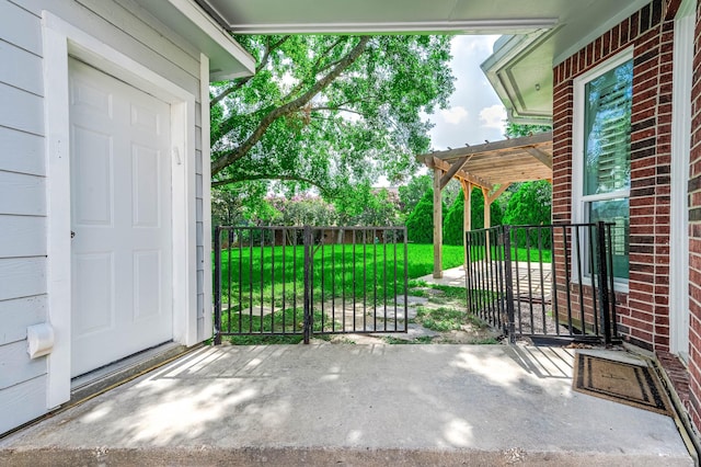 8903 Loch Lomond Ct, Houston, TX 77096 - view of patio featuring a gate and a pergola