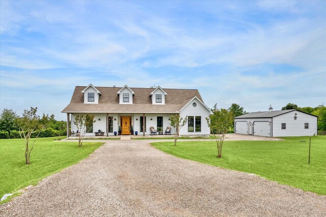 1932 Chappell Ridge Ln, Chappell Hill, TX 77426 - cape cod-style house featuring driveway, an outdoor structure, a porch, a garage, and a front lawn