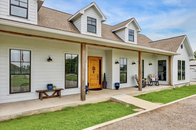 1932 Chappell Ridge Ln, Chappell Hill, TX 77426 - view of front of house featuring covered porch and a shingled roof
