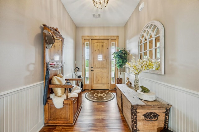 1932 Chappell Ridge Ln, Chappell Hill, TX 77426 - foyer entrance featuring dark wood finished floors and wainscoting