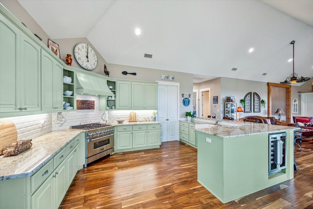 1932 Chappell Ridge Ln, Chappell Hill, TX 77426 - kitchen featuring stainless steel range, premium range hood, vaulted ceiling, open shelves, and green cabinets