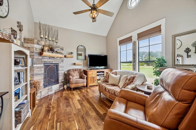 1932 Chappell Ridge Ln, Chappell Hill, TX 77426 - living room featuring high vaulted ceiling, a fireplace, ceiling fan, and wood-type flooring