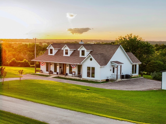 1932 Chappell Ridge Ln, Chappell Hill, TX 77426 - view of front of property featuring covered porch, dirt driveway, a chimney, and a front yard