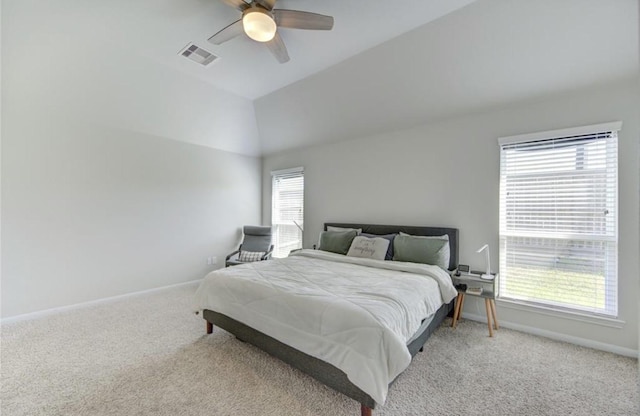 20910 Big Cypress Creek Trl, Humble, TX 77338 - bedroom with light carpet, baseboards, ceiling fan, and vaulted ceiling