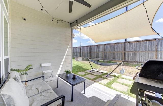 20910 Big Cypress Creek Trl, Humble, TX 77338 - fenced backyard featuring a patio area and a ceiling fan
