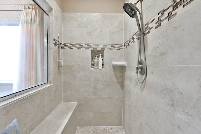 2107 N Shadow Grove Ln, Richmond, TX 77406 - full bath featuring tiled shower and plenty of natural light