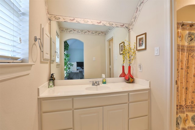2107 N Shadow Grove Ln, Richmond, TX 77406 - bathroom with vanity and a shower with curtain