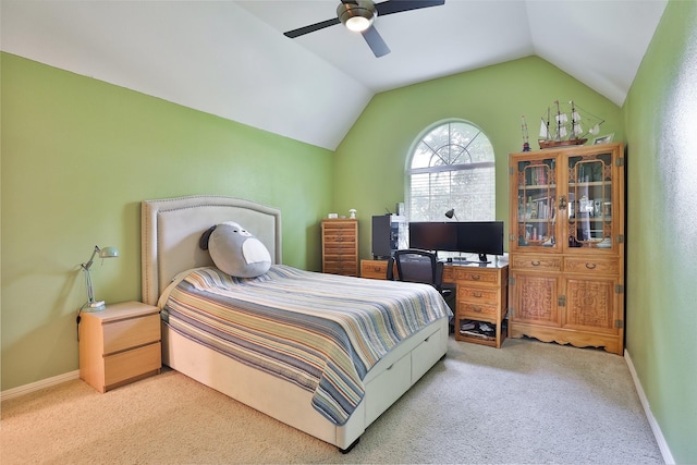 2107 N Shadow Grove Ln, Richmond, TX 77406 - carpeted bedroom with vaulted ceiling, a ceiling fan, and baseboards