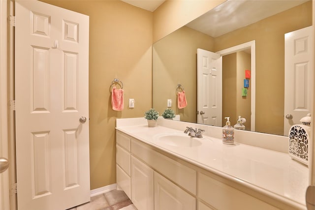 2107 N Shadow Grove Ln, Richmond, TX 77406 - bathroom featuring vanity, tile patterned flooring, and baseboards