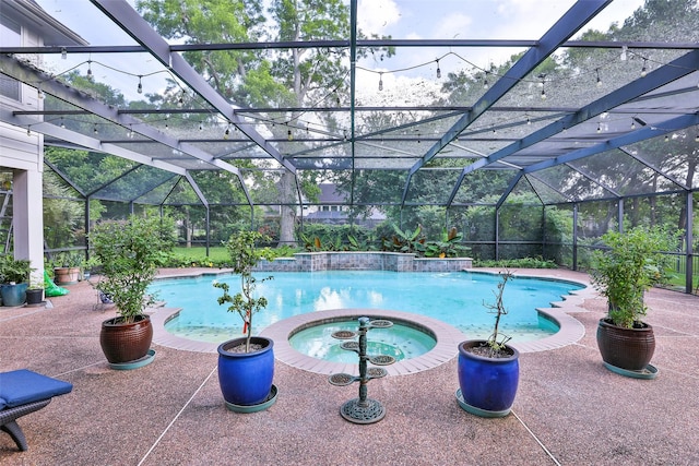 2107 N Shadow Grove Ln, Richmond, TX 77406 - view of swimming pool with a lanai, a patio area, and a pool with connected hot tub