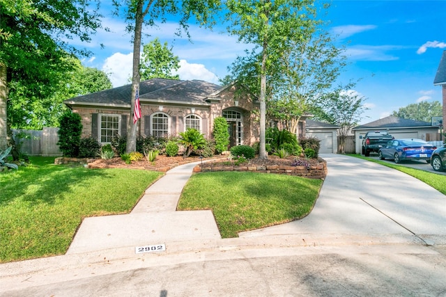 2902 Sycamore Tree Ct, Houston, TX 77345 - view of front facade with a garage, driveway, and a shingled roof