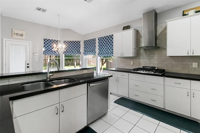 2902 Sycamore Tree Ct, Houston, TX 77345 - kitchen featuring stainless steel appliances, wall chimney exhaust hood, a sink, and dark countertops