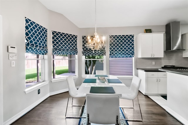2902 Sycamore Tree Ct, Houston, TX 77345 - dining area featuring a chandelier, dark wood-style flooring, and vaulted ceiling
