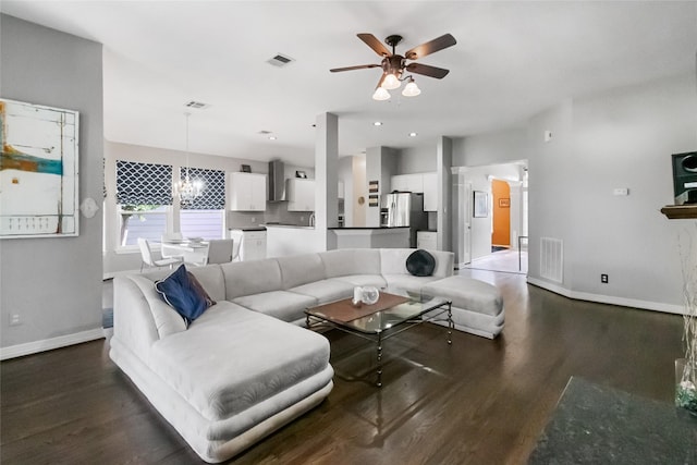 2902 Sycamore Tree Ct, Houston, TX 77345 - living area featuring ceiling fan, baseboards, and dark wood-style floors