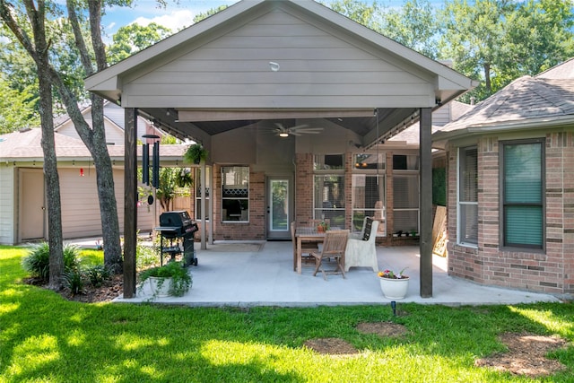 2902 Sycamore Tree Ct, Houston, TX 77345 - rear view of property with brick siding, ceiling fan, a yard, and a patio area