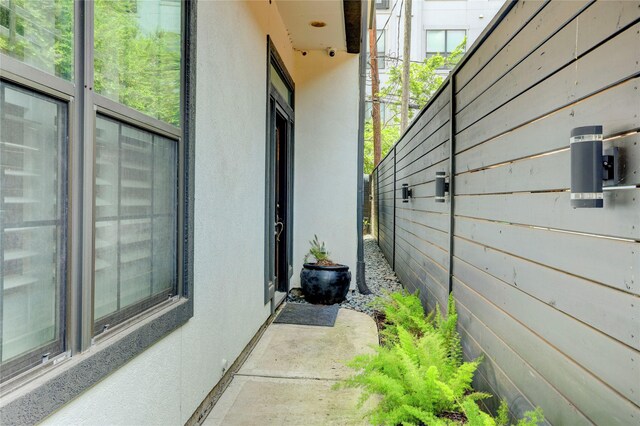 1210 Crocker St, Houston, TX 77019 - view of property exterior with stucco siding