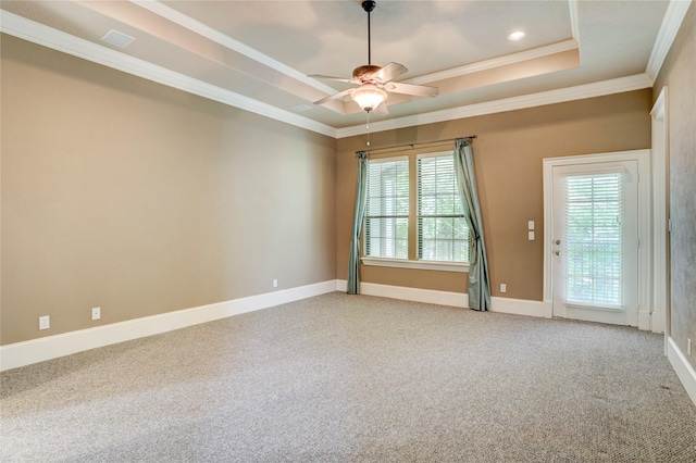 1210 Crocker St, Houston, TX 77019 - carpeted spare room with a tray ceiling, crown molding, a ceiling fan, and baseboards