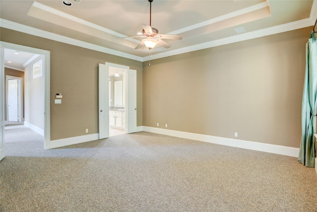 1210 Crocker St, Houston, TX 77019 - unfurnished room with a raised ceiling, crown molding, light colored carpet, and ceiling fan