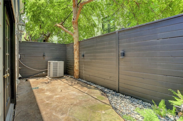 1210 Crocker St, Houston, TX 77019 - view of patio / terrace featuring cooling unit