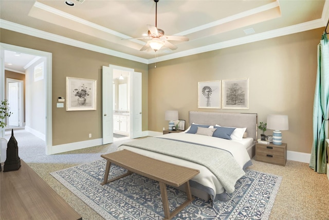 1210 Crocker St, Houston, TX 77019 - bedroom featuring a raised ceiling, crown molding, baseboards, carpet flooring, and ensuite bath