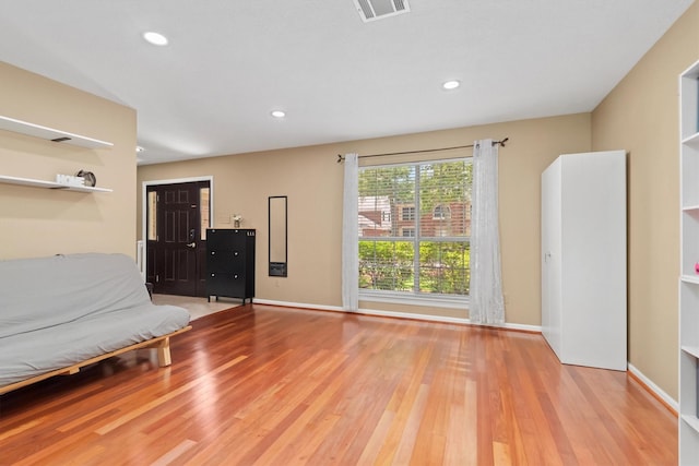 3802 Sweetgum Hill Ln, Kingwood, TX 77345 - unfurnished living room featuring wood finished floors, recessed lighting, and baseboards