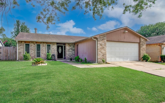 5706 Spring Grove Ln, Spring, TX 77373 - ranch-style house featuring a garage, concrete driveway, and brick siding