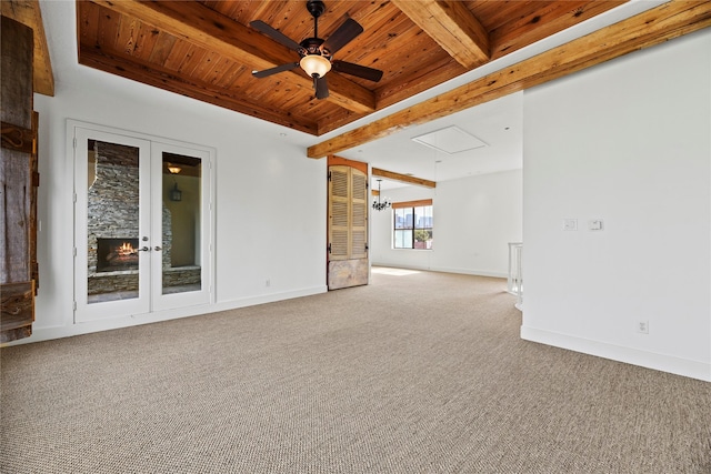 624 Harold St, Houston, TX 77006 - carpeted spare room with wooden ceiling with exposed beams, attic access, ceiling fan, and baseboards
