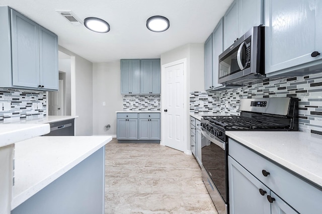 6701 Hidden Colony Ln, League City, TX 77539 - kitchen featuring stainless steel appliances and decorative backsplash