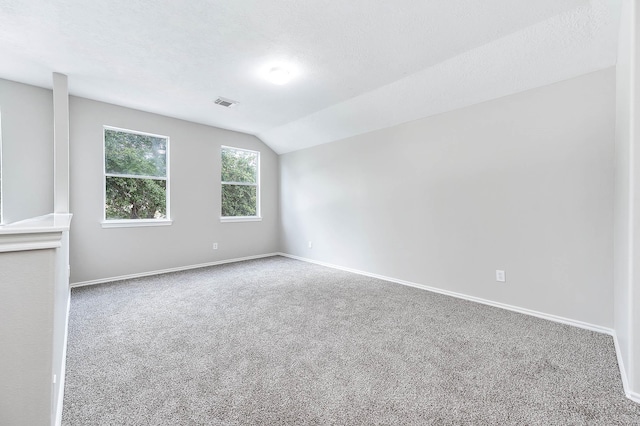 6701 Hidden Colony Ln, League City, TX 77539 - carpeted empty room featuring baseboards and lofted ceiling