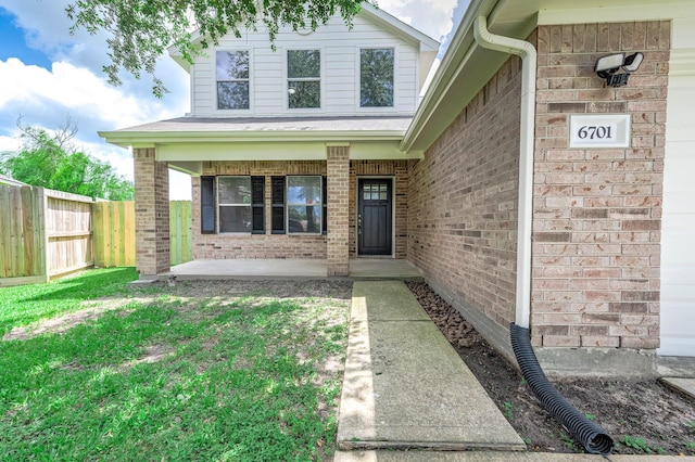 6701 Hidden Colony Ln, League City, TX 77539 - doorway to property featuring brick siding