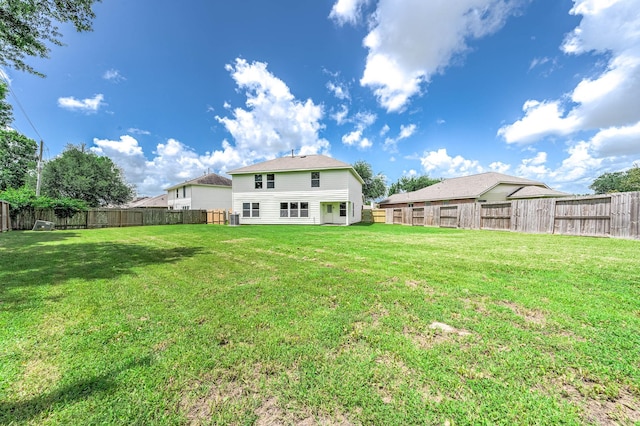 6701 Hidden Colony Ln, League City, TX 77539 - rear view of house with a fenced backyard