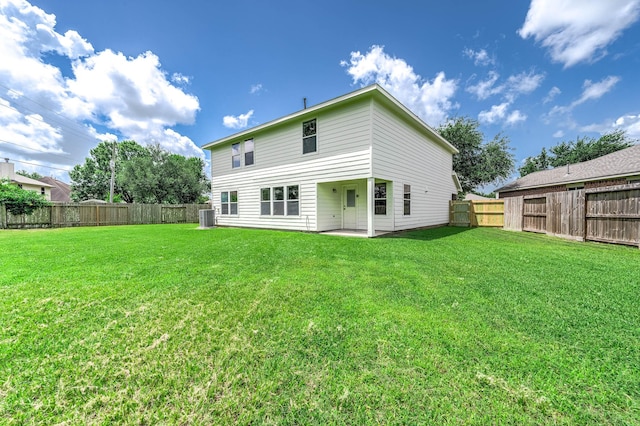 6701 Hidden Colony Ln, League City, TX 77539 - back of house with a fenced backyard and a patio