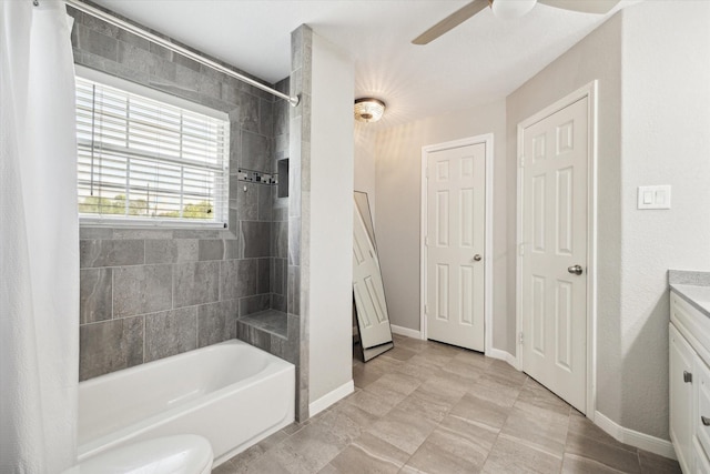 3415 Jack Beaver Rd, Santa Fe, TX 77517 - bathroom featuring shower / bathtub combination with curtain, vanity, ceiling fan, and baseboards