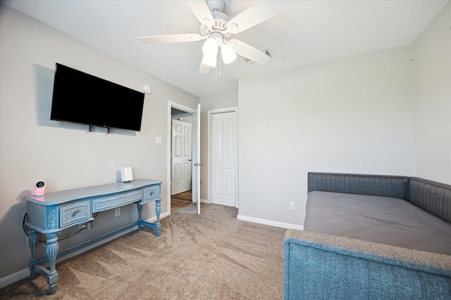 3415 Jack Beaver Rd, Santa Fe, TX 77517 - carpeted bedroom featuring baseboards, a closet, and ceiling fan