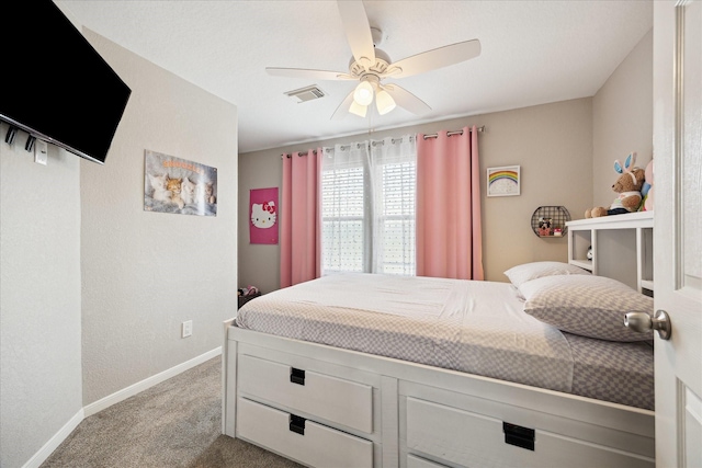 3415 Jack Beaver Rd, Santa Fe, TX 77517 - bedroom featuring carpet, baseboards, and a ceiling fan
