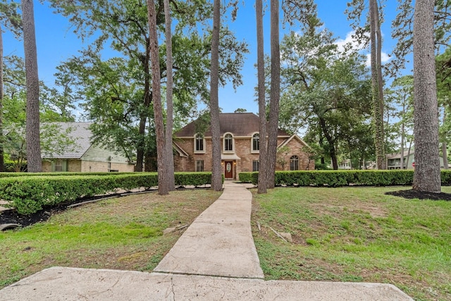 6623 Coral Ridge Rd, Houston, TX 77069 - view of front of house featuring brick siding and a front lawn