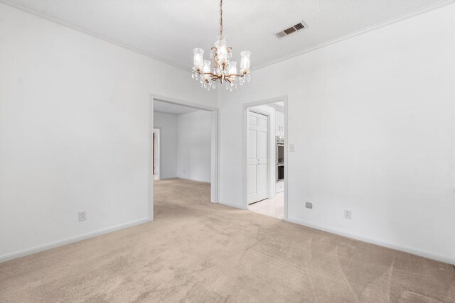 6623 Coral Ridge Rd, Houston, TX 77069 - carpeted empty room with a chandelier, baseboards, and ornamental molding