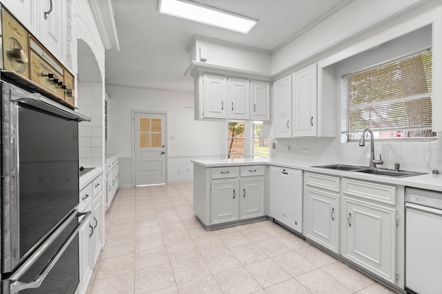 6623 Coral Ridge Rd, Houston, TX 77069 - kitchen featuring white dishwasher, a sink, light countertops, decorative backsplash, and a peninsula