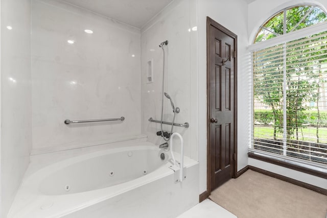 6623 Coral Ridge Rd, Houston, TX 77069 - bathroom featuring a combined bath / shower with jetted tub and baseboards
