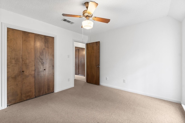 6623 Coral Ridge Rd, Houston, TX 77069 - unfurnished bedroom with carpet floors, baseboards, a closet, and ceiling fan