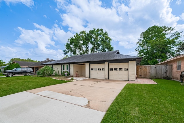 15726 Blackhawk Blvd, Friendswood, TX 77546 - ranch-style home with a garage, brick siding, and concrete driveway