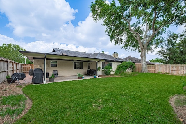 15726 Blackhawk Blvd, Friendswood, TX 77546 - back of house featuring a patio area and a chimney