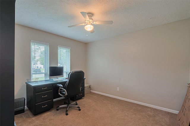 15726 Blackhawk Blvd, Friendswood, TX 77546 - office with a ceiling fan, light carpet, a textured ceiling, and baseboards