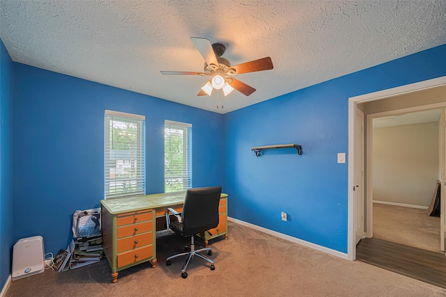 15726 Blackhawk Blvd, Friendswood, TX 77546 - office space with a ceiling fan, a textured ceiling, carpet floors, and baseboards