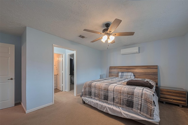 15726 Blackhawk Blvd, Friendswood, TX 77546 - bedroom featuring a wall mounted air conditioner, carpet floors, baseboards, and a textured ceiling