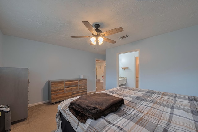 15726 Blackhawk Blvd, Friendswood, TX 77546 - bedroom featuring carpet, baseboards, a ceiling fan, ensuite bathroom, and a textured ceiling