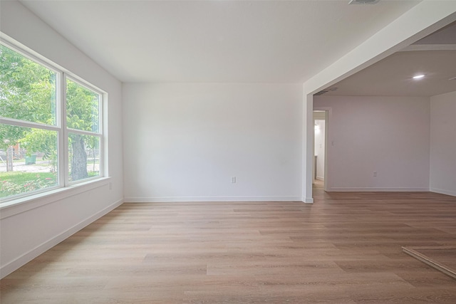 606 Cresline St, Houston, TX 77076 - unfurnished room with baseboards and light wood-style flooring