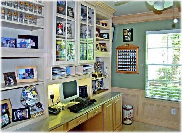 3 Candle Pine Pl, The Woodlands, TX 77381 - office space with a wainscoted wall, healthy amount of natural light, and a decorative wall