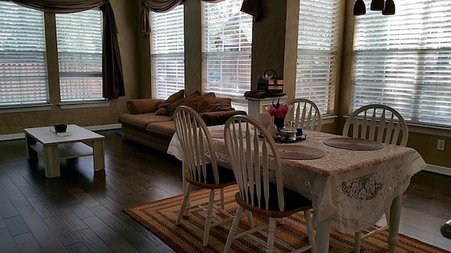 3 Candle Pine Pl, The Woodlands, TX 77381 - dining space featuring baseboards and wood-type flooring
